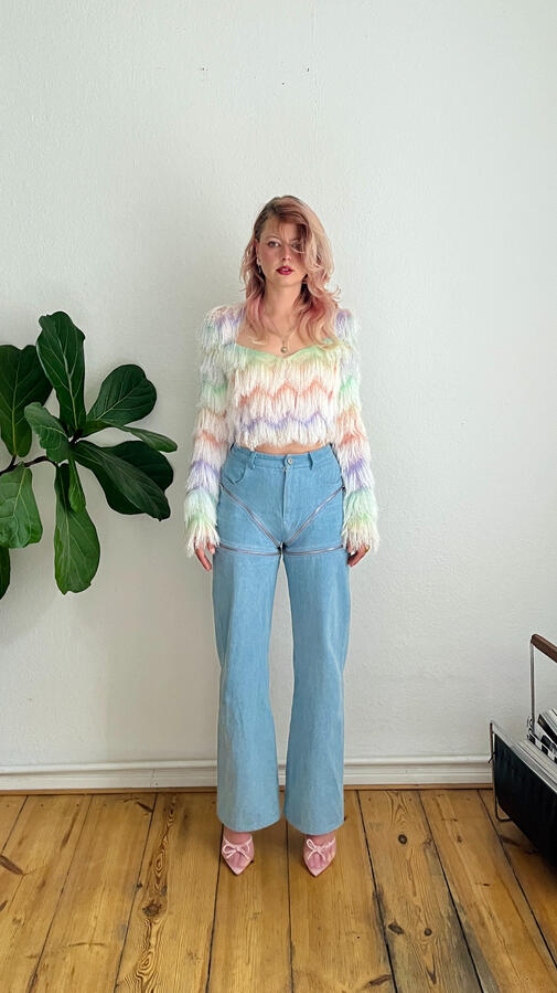 ephani modular jeans worn full-length as wide-leg denim, front view, styled with a pastel fringe top